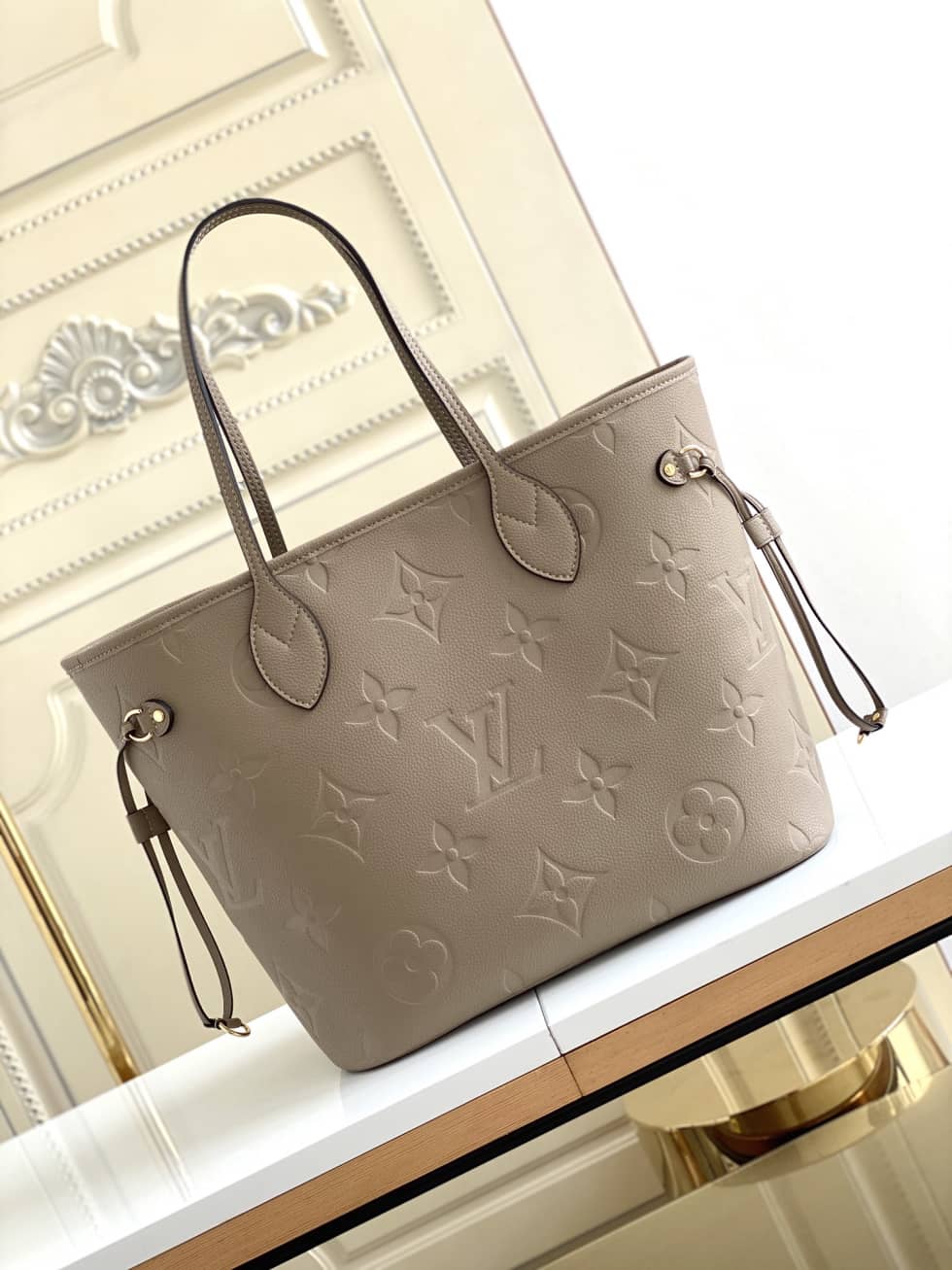 L0vis Vvtt0n Monogram Empreinte Neverfull MM Brown M45685 Replica Tote