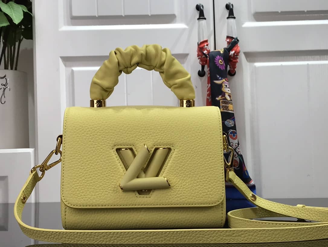 L0vis Vvtt0n Replica Bags Twist PM Pondichery Taurillon Replica Leather Bag Yellow M58691