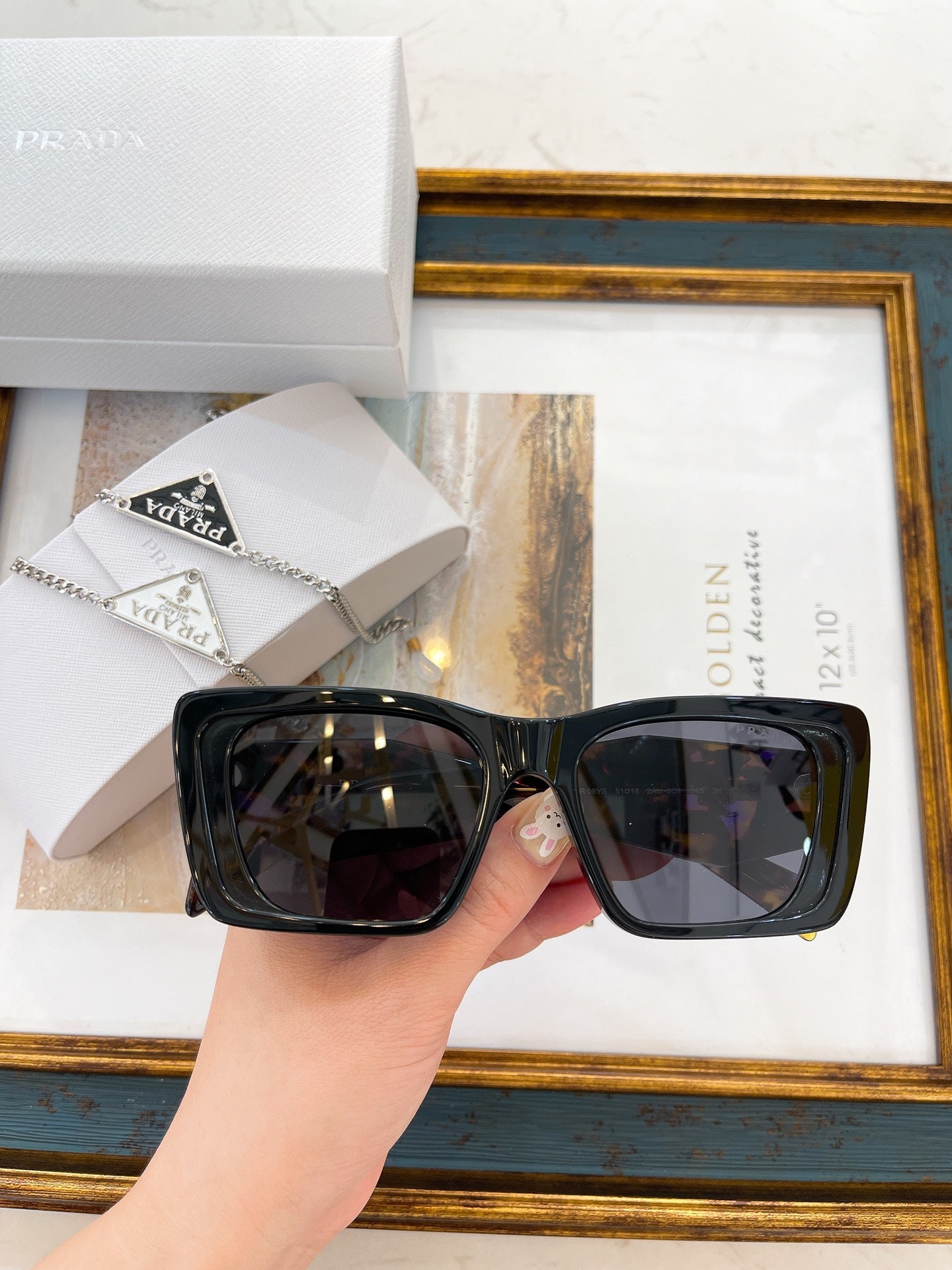 Pra*a Sunglasses